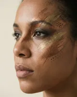 AI-generated reference for the Fantasy warrior idea: bronze and gold metallic strokes across the eye and cheekbone